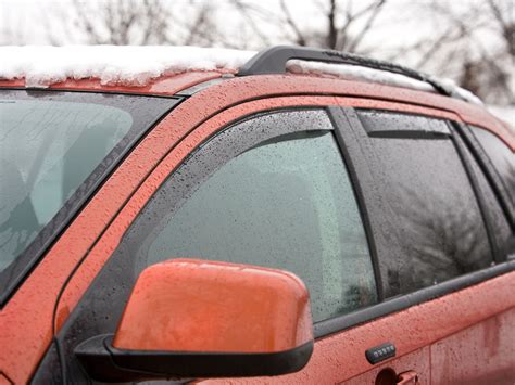 WeatherTech Side Window Deflectors let you crack your windows open without getting poured on. . Weathertech rain guard